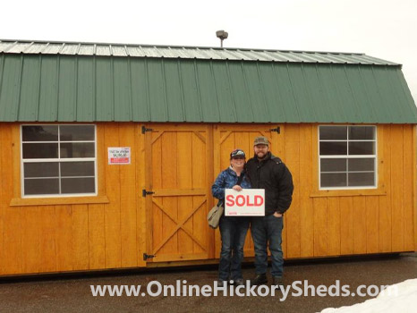 A couple happy with their new Hickory Shed