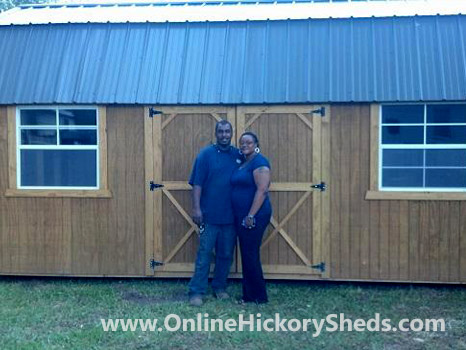 A couple happy with their new Hickory Shed