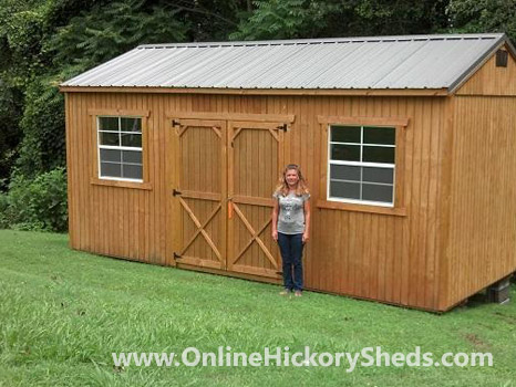 A woman happy with her new Hickory Shed