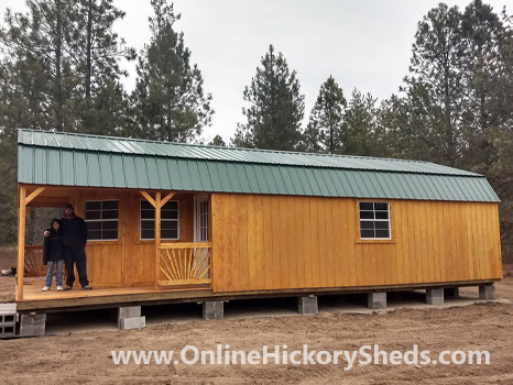 A father and son happy with their new Hickory Shed