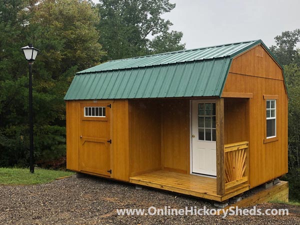 Hickory Sheds Lofted Side Porch Stained Honey Gold with Hunter Green Metal Roof